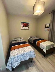 Ліжко або ліжка в номері Maison de 3 chambres a Valras Plage a 600 m de la plage avec spa jardin clos et wifi