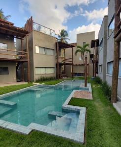 a swimming pool in the backyard of a house at CASA EM SÃO MIGUEL DOS MILAGRES in São Miguel dos Milagres