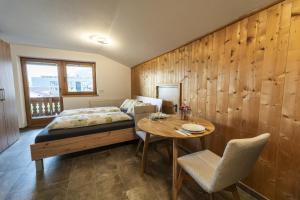 Łóżko lub łóżka w pokoju w obiekcie Apartments Wimpissinger