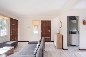 Posezení v ubytování Casa Bosco Villa La Angostura + 43 fotografií