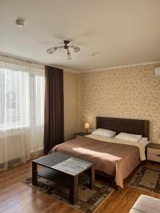 Posteľ alebo postele v izbe v ubytovaní Lileya Hotel
