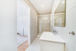 Koupelna v ubytování Ajuda Deluxe Apartments + 71 fotografií