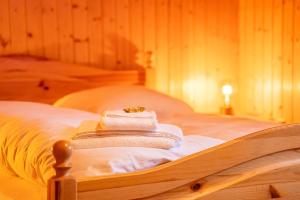 Krevet ili kreveti u jedinici u okviru objekta Chalet Collini