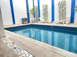 Bazén v ubytování Blue Diamond House nebo v jeho okolí