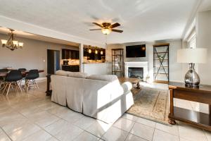 a living room with a couch and a table at Updated Robinson Vacation Rental with Fireplace! in Robinson