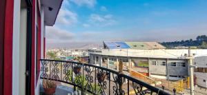 a balcony with a view of a city at HOTEL KEYMAR SPA in Moquegua