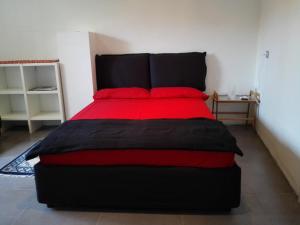 Postel nebo postele na pokoji v ubytování B&B Rosa Blu