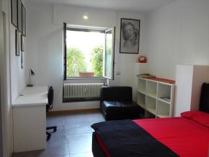 Postel nebo postele na pokoji v ubytování B&B Rosa Blu