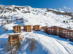 an aerial view of a resort in the snow at Chalet Les Arcs 1800, 8 pièces, 14 personnes - FR-1-686-29 in Arc 1800