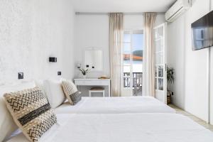 Postel nebo postele na pokoji v ubytování Aperitton Hotel