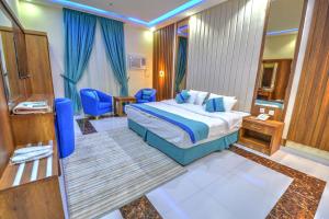 Ένα ή περισσότερα κρεβάτια σε δωμάτιο στο سي مون للشقق الفندقية sea moon hotel