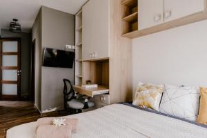Postel nebo postele na pokoji v ubytování LA88 Bayview Rooms