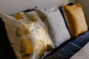 Postel nebo postele na pokoji v ubytování LA88 Bayview Rooms