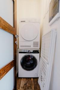 Kuchyň nebo kuchyňský kout v ubytování LA88 Bayview Rooms