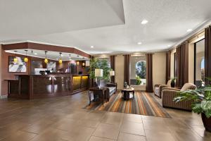 a living room with a couch and a table at Quality Inn Dandridge in Dandridge