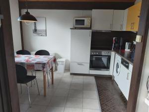 Kuchyň nebo kuchyňský kout v ubytování Studiohaus PIRATENWEG 145