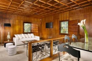 a living room with a couch and a table at Torre delle Cornacchie in Rome