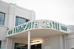a sign on the front of a building at The Tynemouth Castle Inn - The Inn Collection Group in Tynemouth