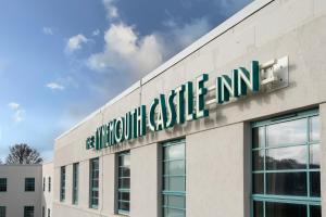 a sign on the side of a building at The Tynemouth Castle Inn - The Inn Collection Group in Tynemouth