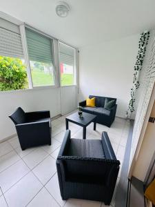 SAB Location - Appartement的休息区