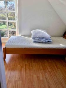 Postel nebo postele na pokoji v ubytování Nordsoe Housing-Rørby Kalundborg