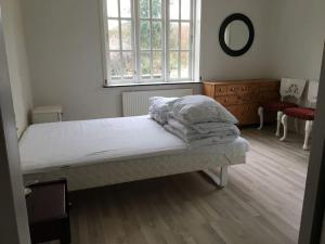 Postel nebo postele na pokoji v ubytování Nordsoe Housing-Rørby Kalundborg