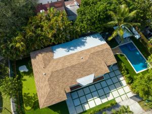 an overhead view of a house with a swimming pool at Havana House Miami in Miami