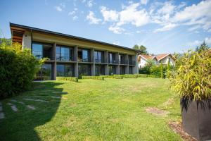 a building with a yard in front of it at Le Petit Létraz in Duingt +42 photos