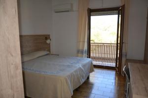 Postel nebo postele na pokoji v ubytování Hotel Citti