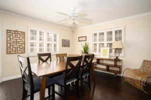 a dining room with a table and chairs at Charming 4BR Retreat - Near Old Town Monrovia in Monrovia