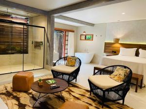 Uma área de estar em Hiu Hotel