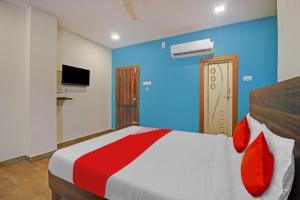 Posteľ alebo postele v izbe v ubytovaní POP 81014 Abhi Square