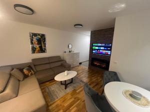 Posezení v ubytování Golden Forest apartman 7
