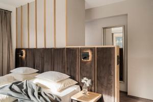 Jagdhof PURE Mountain Appartementsにあるベッド