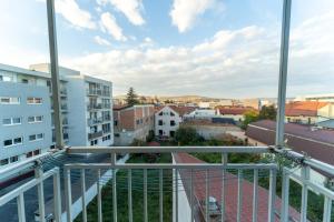 a view from the balcony of a building at Spacious 3 rooms 5* mansion near Muzeului square. Free parking in Cluj-Napoca