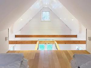 a loft conversion of a house with two beds at 4 star holiday home in TORHAMN-By Traum in Torhamn
