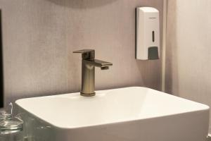 Koupelna v ubytování Artearia Hotel + 57 fotografií