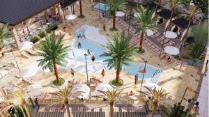 una vista aérea de un parque acuático con palmeras en Silverton Casino Lodge - Newly Renovated, en Las Vegas