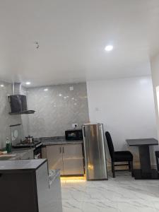 Cuina o zona de cuina de Easyinn Shortlet Apartment