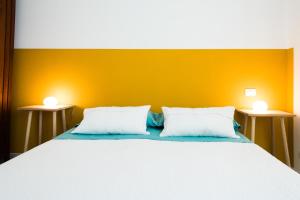 Ένα ή περισσότερα κρεβάτια σε δωμάτιο στο B&B Sa Cruxitta