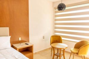 Hotel 5 Inn Select tesisinde bir oturma alanı