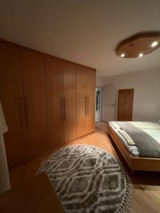 A bed or beds in a room at Ferienwohnungen Bischofshofen