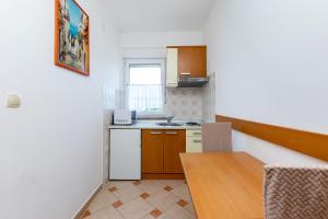 Kuchyňa alebo kuchynka v ubytovaní Apartments Josip S