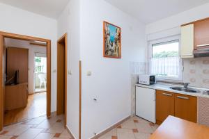 Kuchyňa alebo kuchynka v ubytovaní Apartments Josip S
