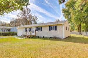 a small white house with a yard at New Bern Abode with Yard about 2 Mi to Neuse River in New Bern