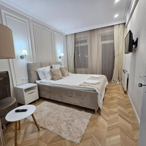 Ліжко або ліжка в номері Apartament M2 Vatra Dornei