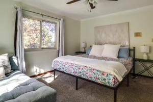 a bedroom with a large bed and a window at Spacious Reno Vacation Rental about 3 Mi to MidTown! in Reno