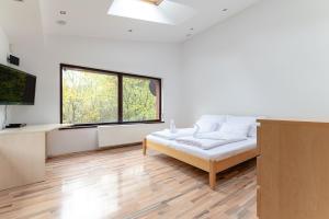 Postel nebo postele na pokoji v ubytování Villa Remata