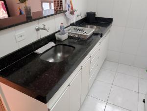 Kuhinja oz. manjša kuhinja v nastanitvi Apartamento Padrão 2° Andar