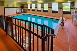 a large swimming pool in a building at Quality Inn & Suites near St Louis and I-255 in Cahokia